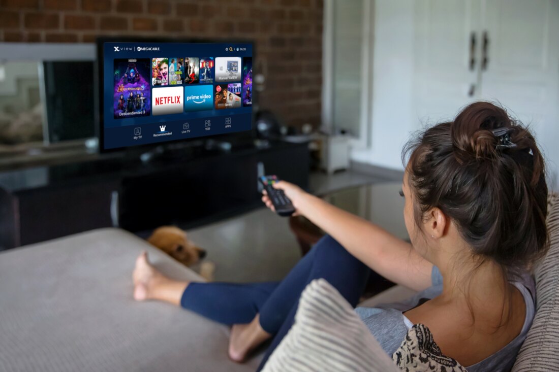 A subscriber browsing Netflix and apps on an upcycled set-top box.